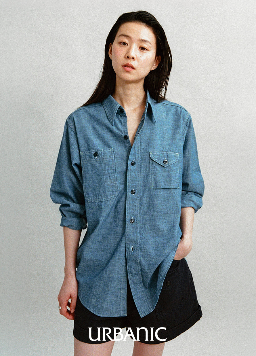 Long chambray work shirt with signature asymmetric pockets and relaxed fit
