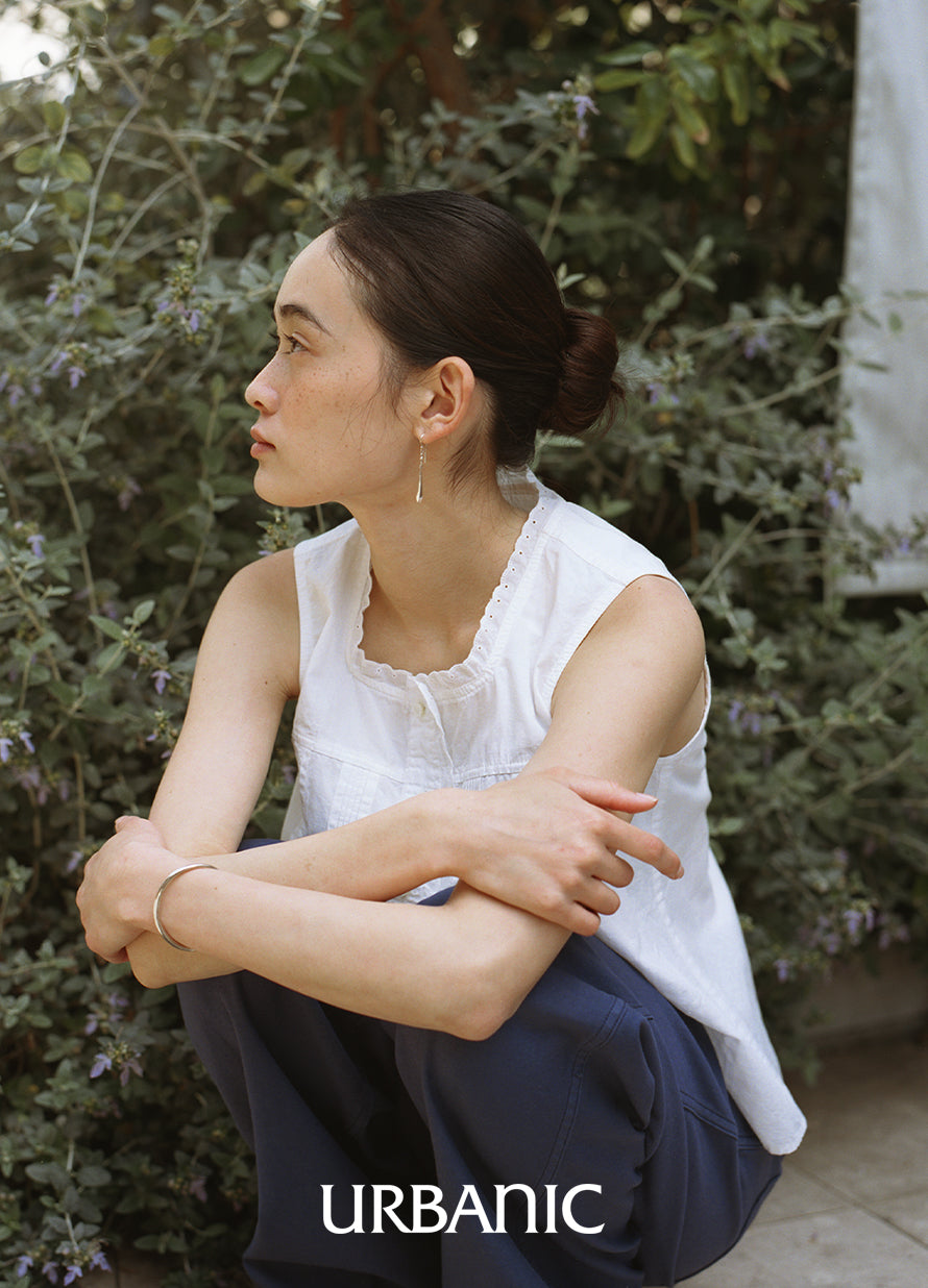 Elegant sleeveless blouse with modest armholes