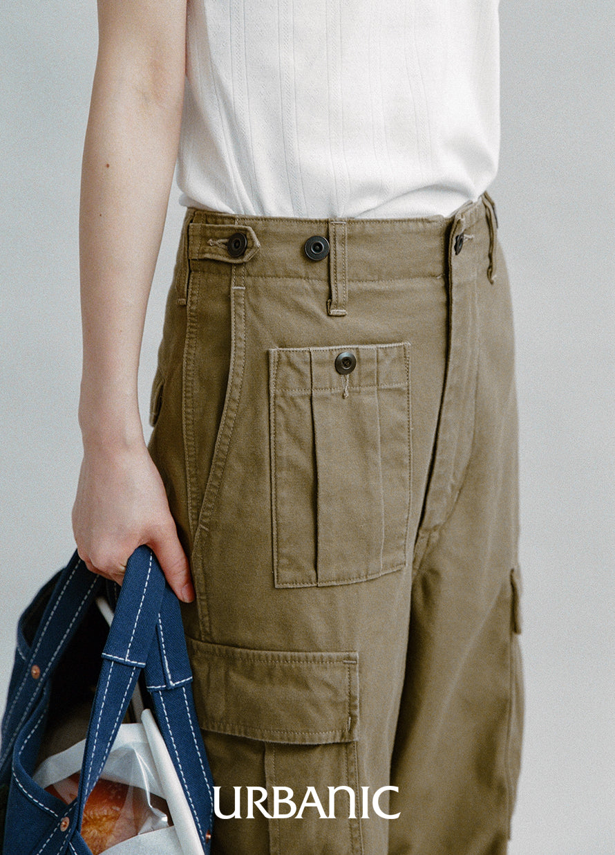 Military-inspired cargo pants with adjustable side tabs and flap pockets