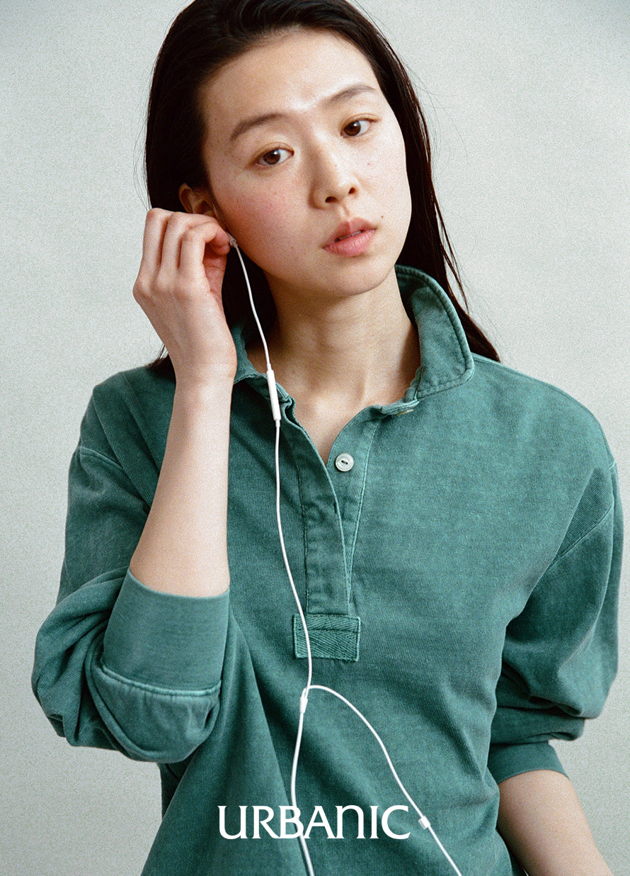 Pigment-dyed cotton polo shirt with a naturally faded vintage look.