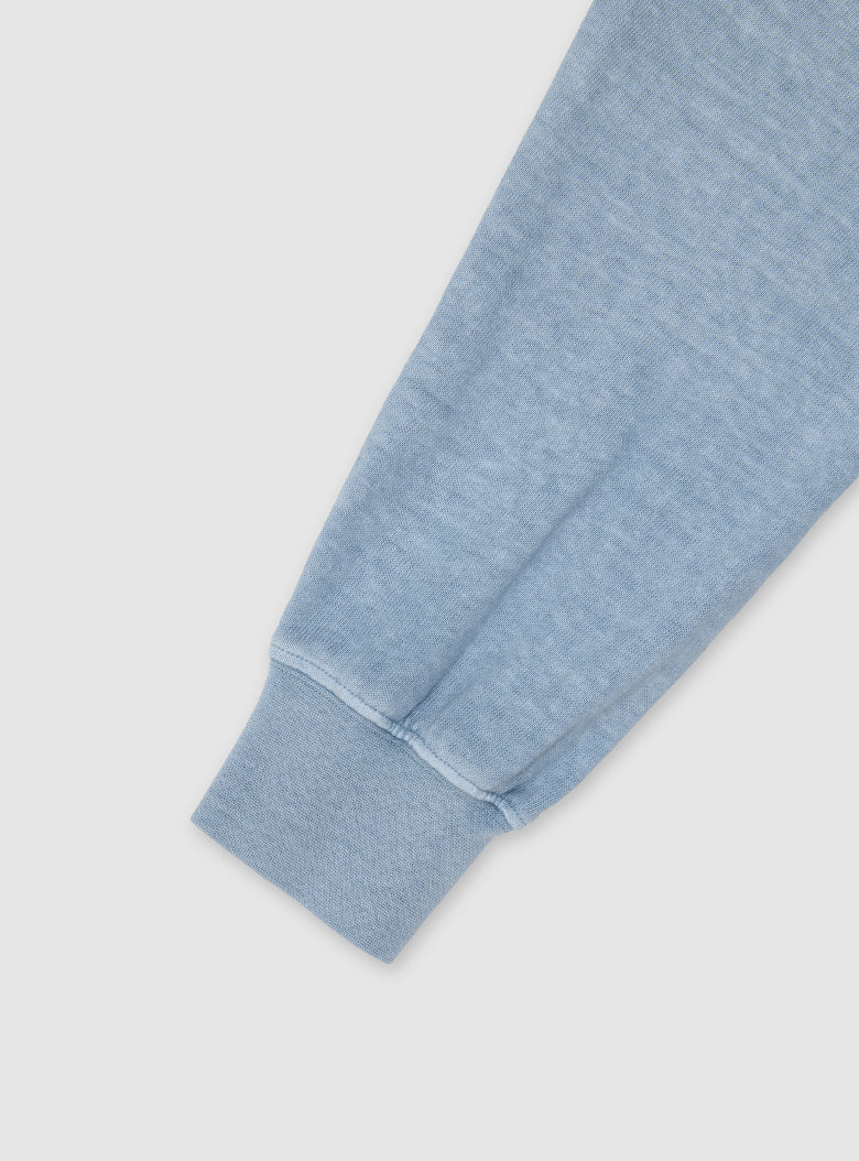 Long-sleeve polo shirt with washed-out seams and a relaxed silhouette.