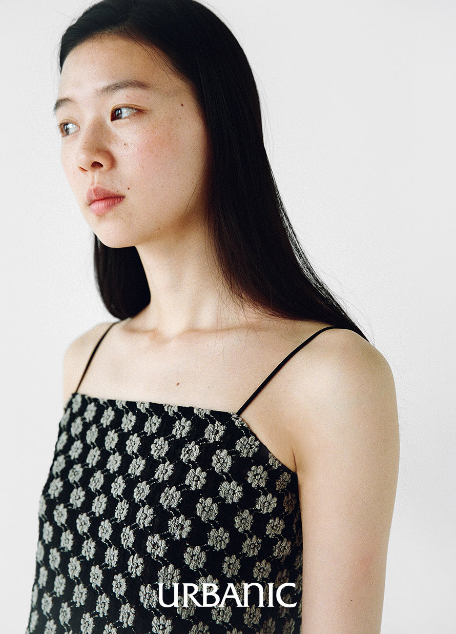 Cotton-nylon blend top with delicate eyelet details