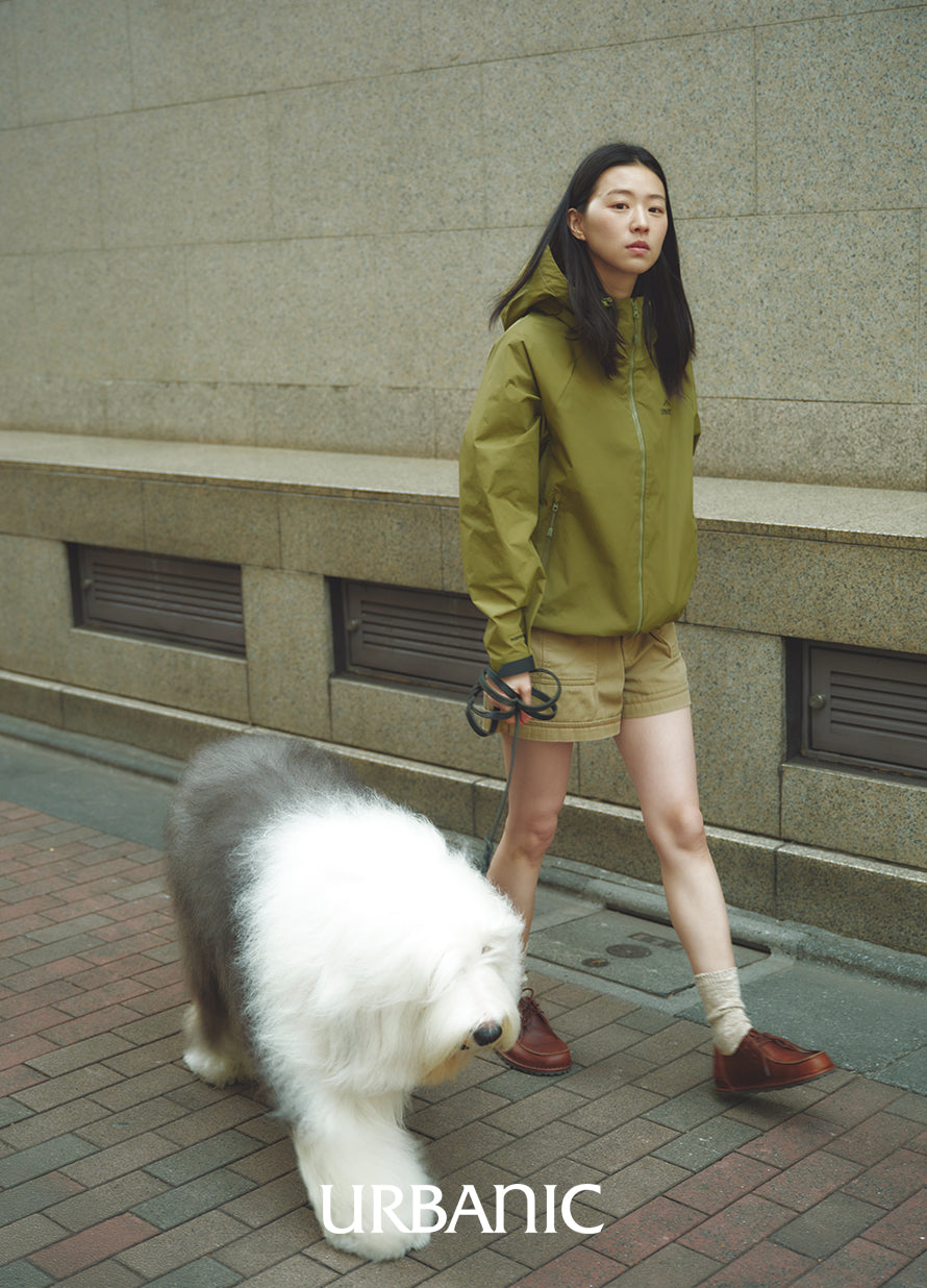 olive nylon jacket styled in a casual look