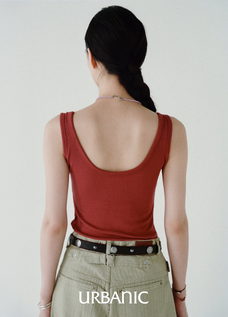 Soft round neckline top with secure chest coverage and clean fit