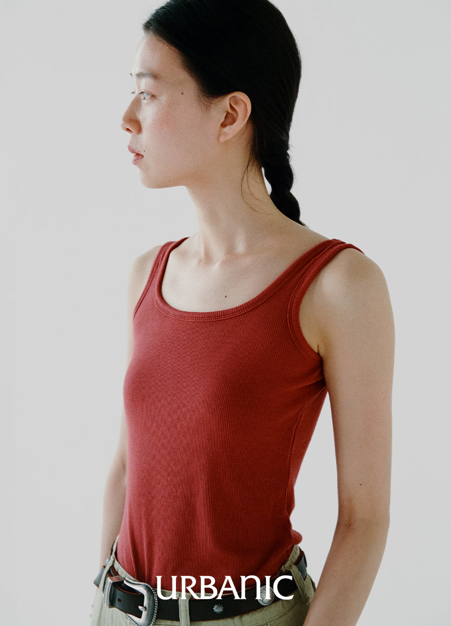 Elegant low-back sleeveless top with minimal armhole exposure