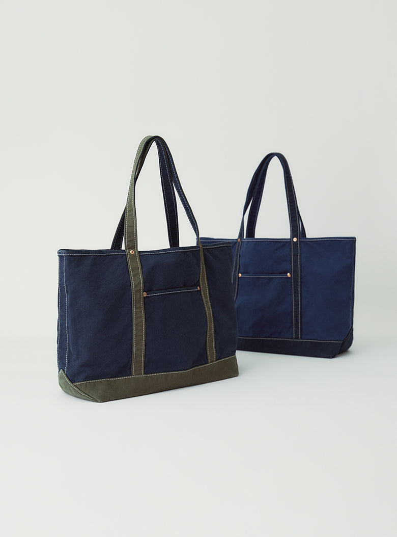 Spacious bag with wide base and outer pocket