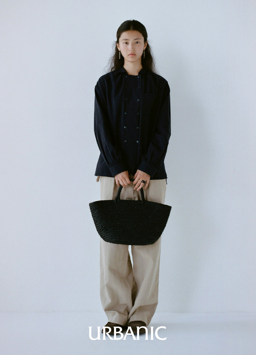 Modern shirt with generous pleating and utilitarian details