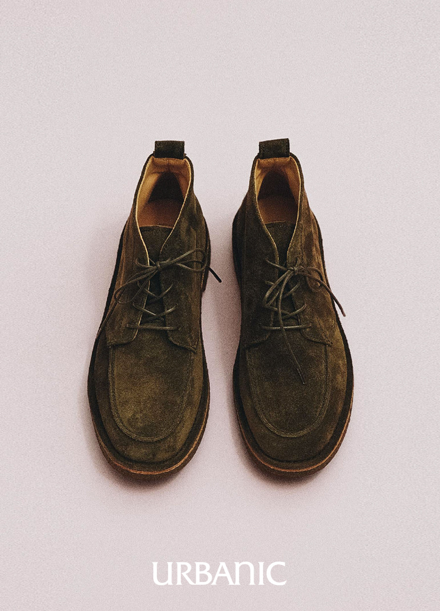 Leather lace-up boots with tan cowhide lining